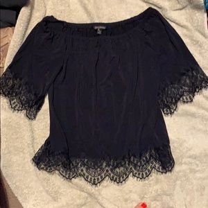 Off the should black lacy top.